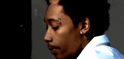 Animated gif of wiz kalifa smoking weed